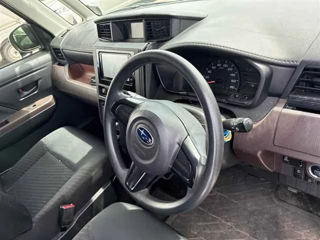 Subaru Justy  с аукциона в Японии