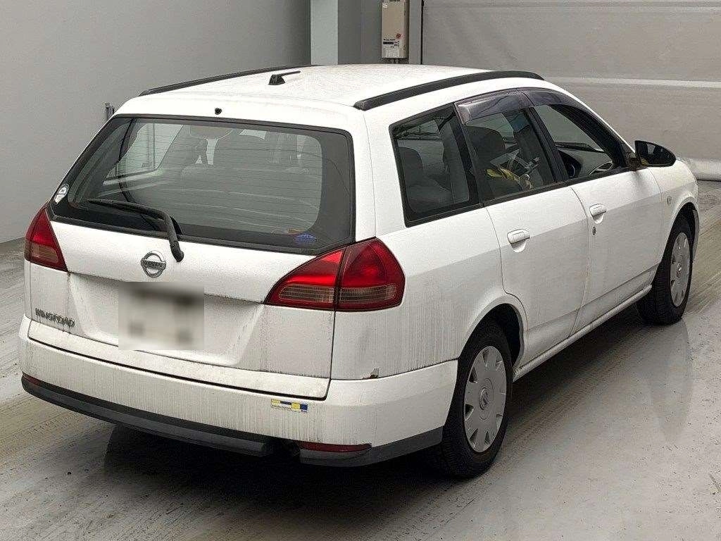 Nissan Wingroad  с аукциона в Японии