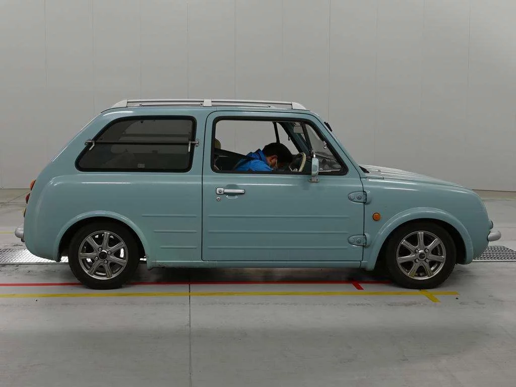 Nissan Pao  с аукциона в Японии