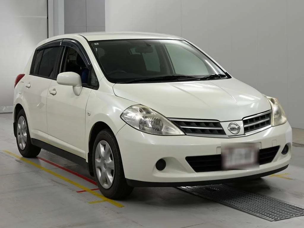 Nissan Tiida  с аукциона в Японии