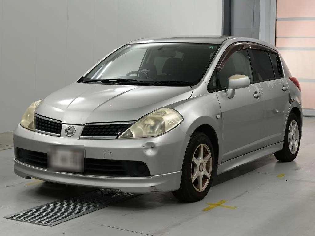 Nissan Tiida  с аукциона в Японии