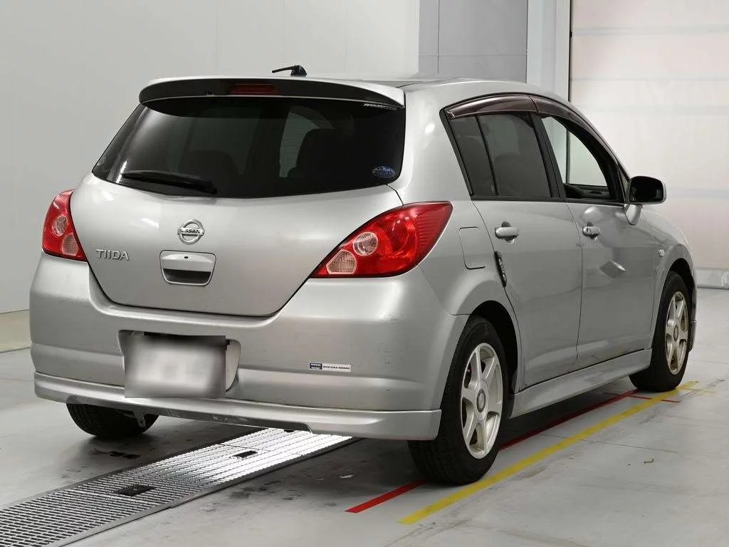 Nissan Tiida  с аукциона в Японии