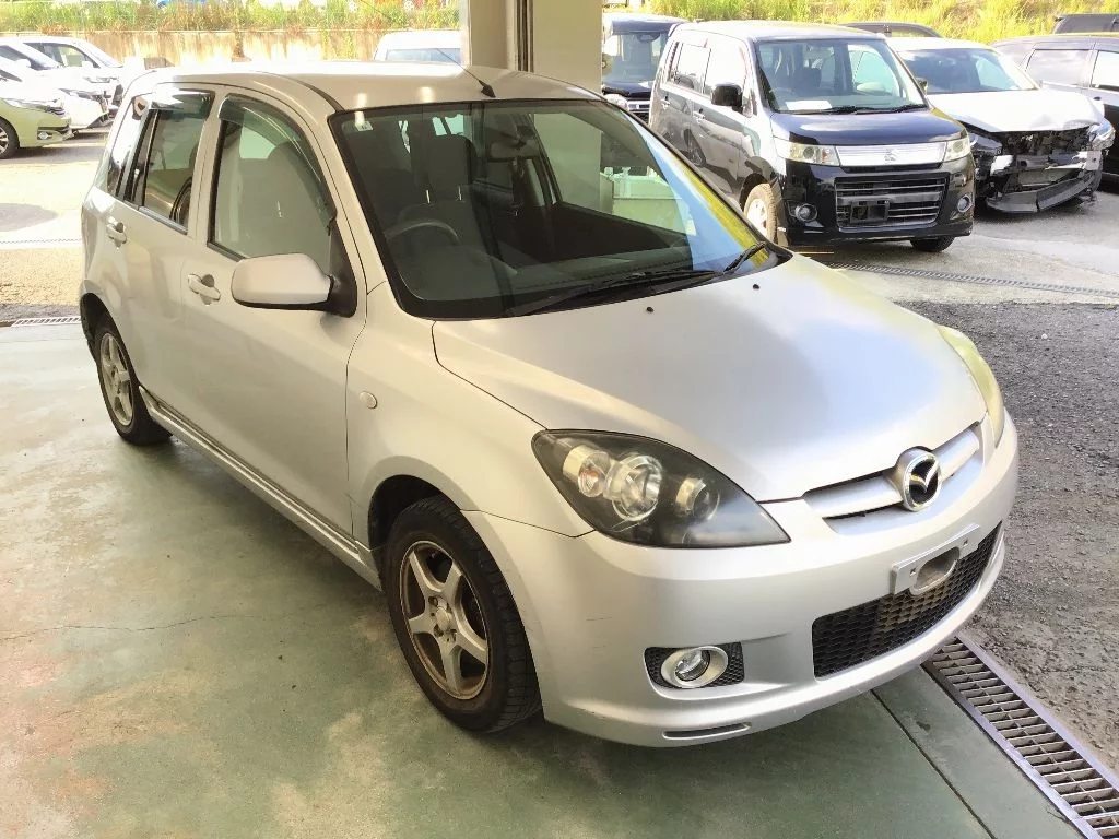 Mazda Demio  с аукциона в Японии
