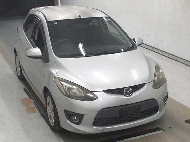 Mazda Demio  с аукциона в Японии