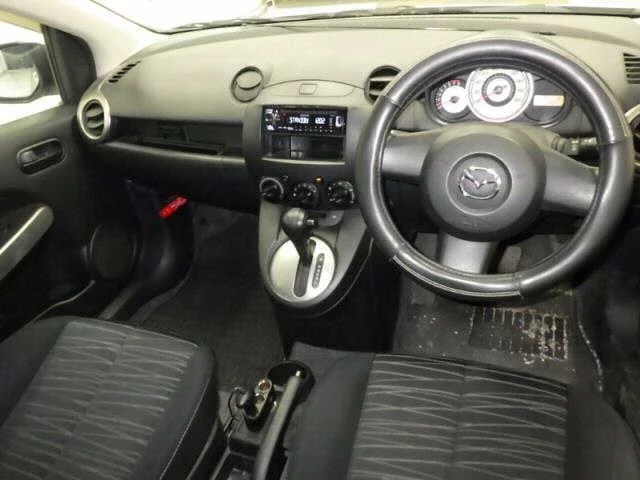 Mazda Demio  с аукциона в Японии