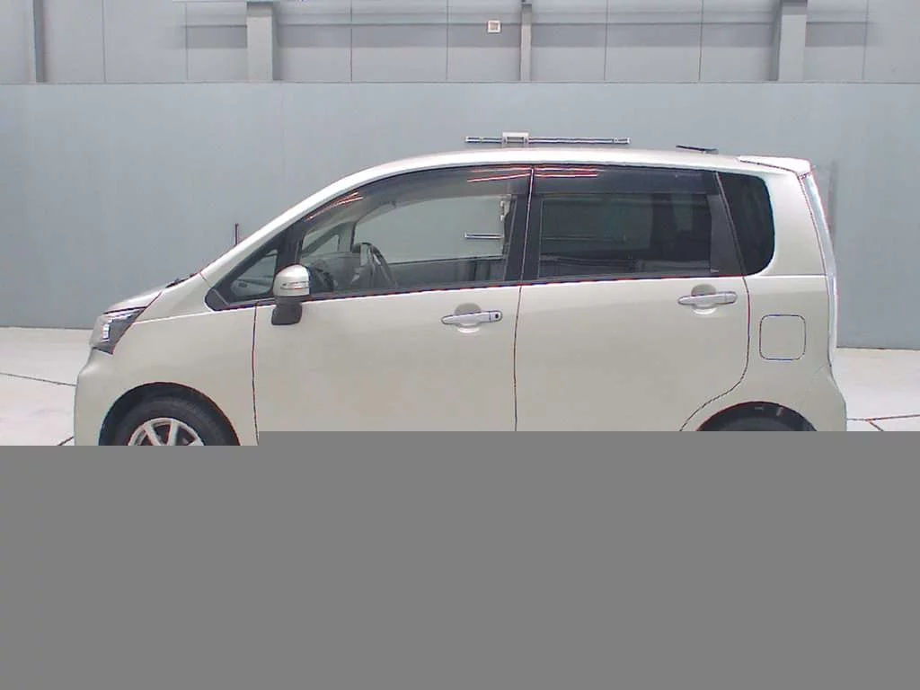 Daihatsu Move  с аукциона в Японии