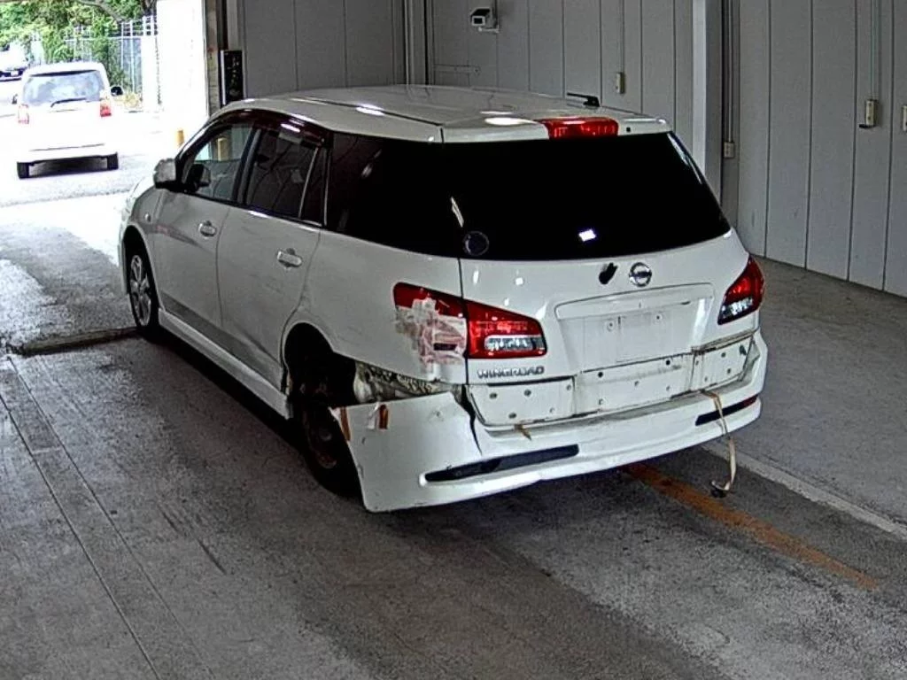 Nissan Wingroad  с аукциона в Японии