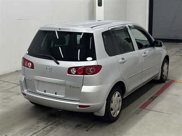 Mazda Demio  с аукциона в Японии