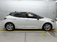 Цена авто Toyota Corolla Hatchback с аукционов Японии, номер кузова ZWE213H, пробег 15 000, оценка 1