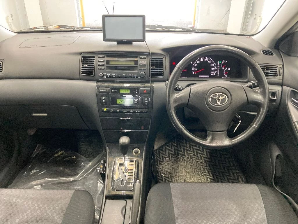 Toyota Corolla Runx  с аукциона в Японии