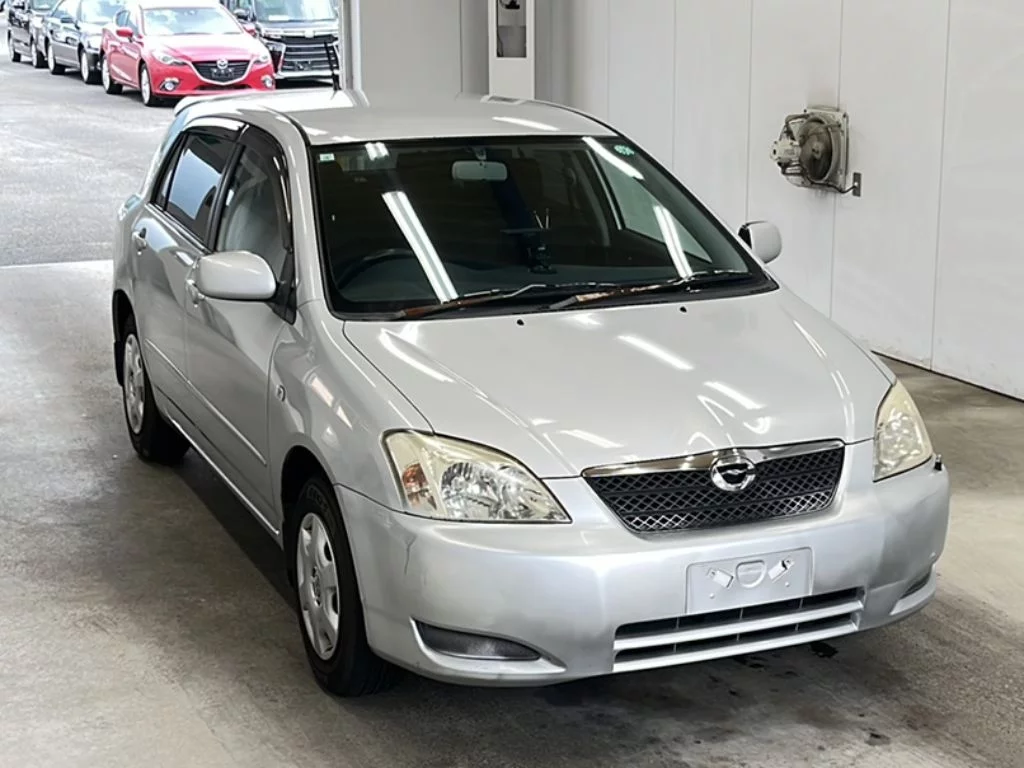 Toyota Corolla Runx  с аукциона в Японии