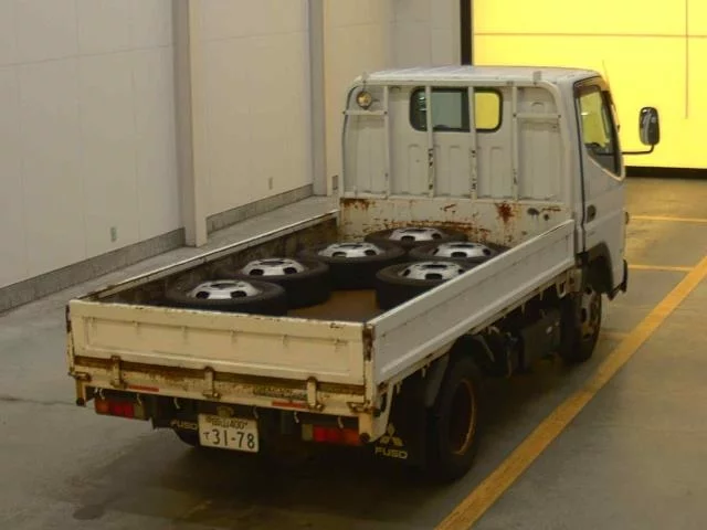 Mitsubishi Fuso Canter  с аукциона в Японии