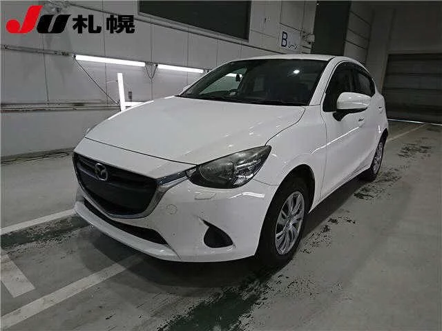 Mazda Demio  с аукциона в Японии