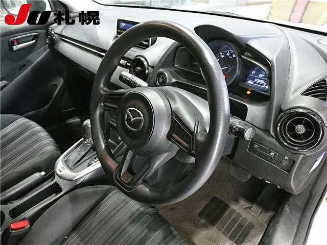 Mazda Demio  с аукциона в Японии