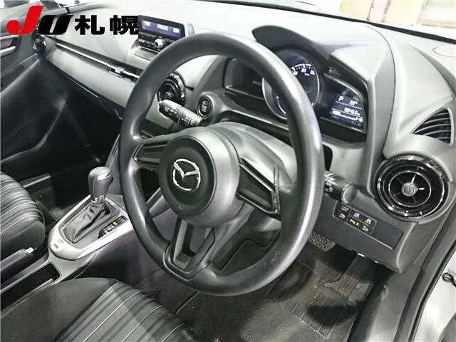 Mazda Demio  с аукциона в Японии