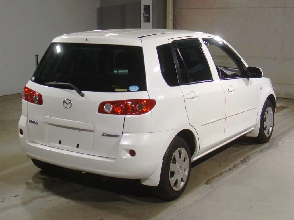 Mazda Demio  с аукциона в Японии