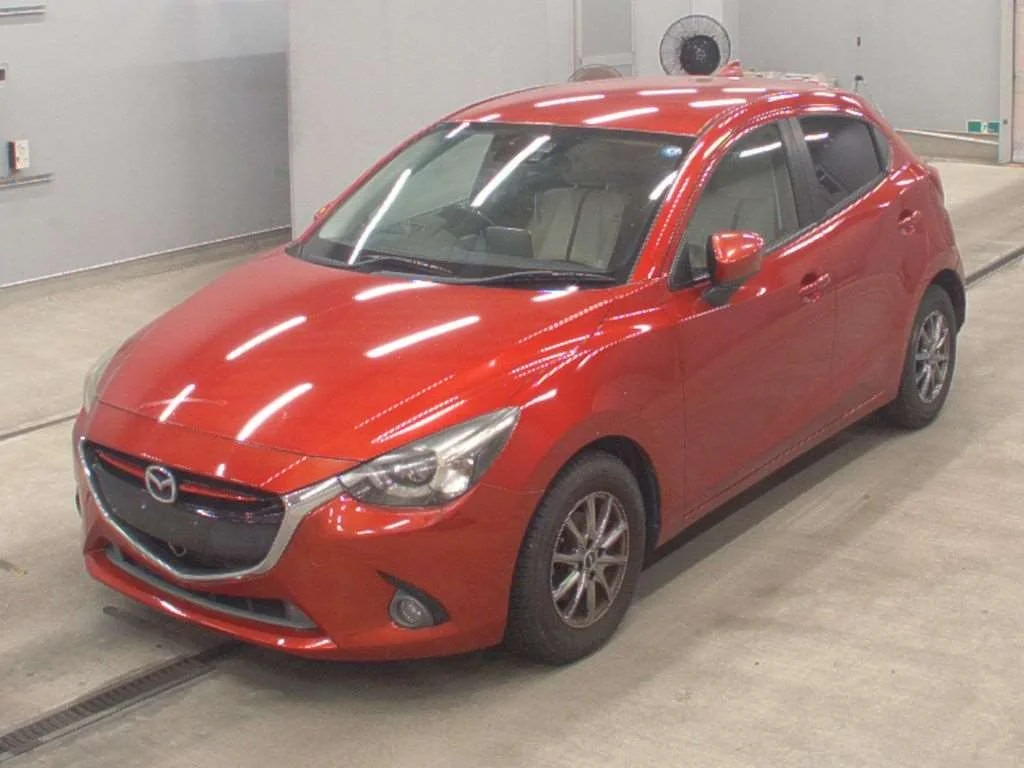 Mazda Demio  с аукциона в Японии