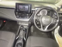 Цена авто Toyota Corolla с аукционов Японии, номер кузова ZWE211W, пробег 128 000, оценка 8