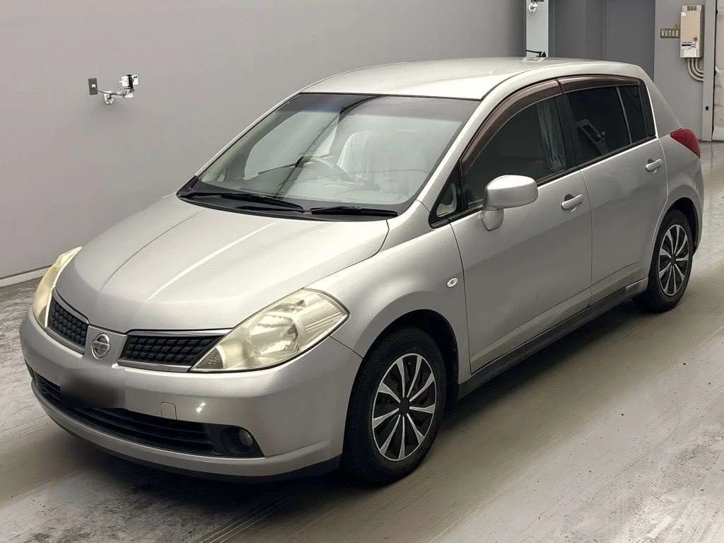 Nissan Tiida  с аукциона в Японии