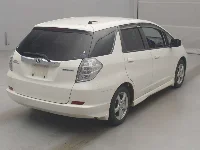Цена авто Honda FIT SHUTTLE HYBRID с аукционов Японии, номер кузова GP2, пробег 158 000, оценка 7