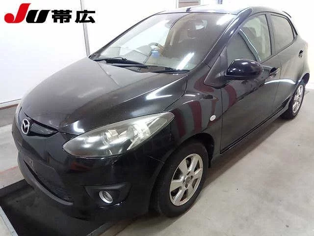 Mazda Demio  с аукциона в Японии