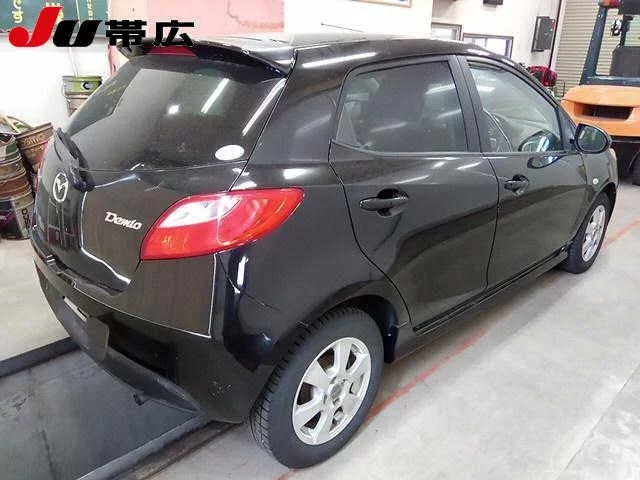 Mazda Demio  с аукциона в Японии