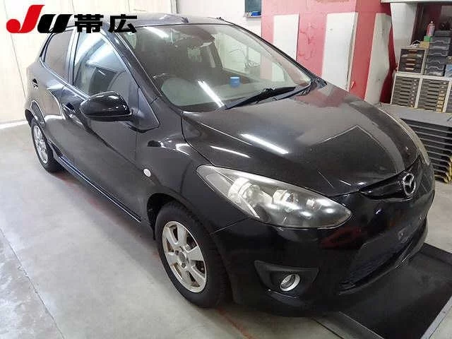 Mazda Demio  с аукциона в Японии