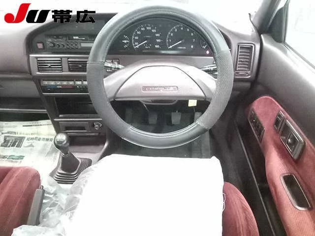 Toyota Corolla  с аукциона в Японии