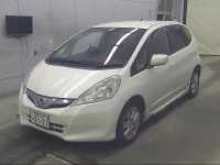 Цена авто Honda Fit с аукционов Японии, номер кузова GP1, пробег 255 000, оценка 6