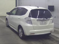 Цена авто Honda Fit с аукционов Японии, номер кузова GP1, пробег 255 000, оценка 6