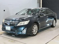 Цена авто Toyota Camry с аукционов Японии, номер кузова AVV50, пробег 129 000, оценка 9