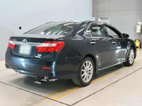 Цена авто Toyota Camry с аукционов Японии, номер кузова AVV50, пробег 129 000, оценка 9