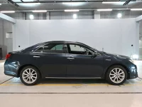 Цена авто Toyota Camry с аукционов Японии, номер кузова AVV50, пробег 129 000, оценка 9