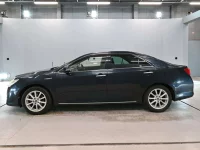 Цена авто Toyota Camry с аукционов Японии, номер кузова AVV50, пробег 129 000, оценка 9