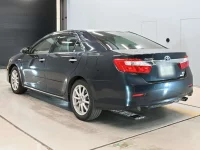 Цена авто Toyota Camry с аукционов Японии, номер кузова AVV50, пробег 129 000, оценка 9