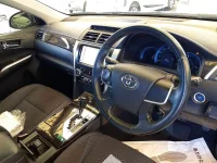 Цена авто Toyota Camry с аукционов Японии, номер кузова AVV50, пробег 129 000, оценка 9
