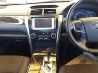 Цена авто Toyota Camry с аукционов Японии, номер кузова AVV50, пробег 129 000, оценка 9