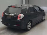 Цена авто Honda FIT SHUTTLE HYBRID с аукционов Японии, номер кузова GP2, пробег 219 000, оценка 7