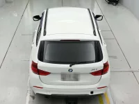 Цена авто BMW X1 с аукционов Японии, номер кузова VL18, пробег 95 000, оценка 8