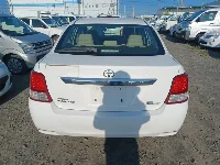 Цена авто Toyota Corolla Axio с аукционов Японии, номер кузова NZE164, пробег 300 000, оценка 2