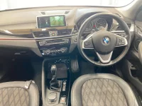 Цена авто BMW X1 с аукционов Японии, номер кузова HT20, пробег 82 000, оценка 8