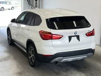 Цена авто BMW X1 с аукционов Японии, номер кузова HT20, пробег 82 000, оценка 8