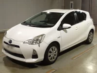 Цена авто Toyota Aqua с аукционов Японии, номер кузова NHP10, пробег 124 000, оценка 2
