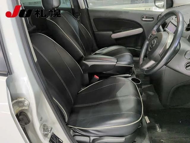 Mazda Demio  с аукциона в Японии