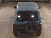 Цена авто Mitsubishi Pajero Mini с аукционов Японии, номер кузова H58A, пробег 163 000, оценка 6