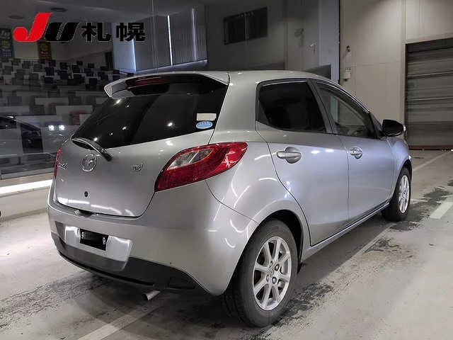 Mazda Demio  с аукциона в Японии