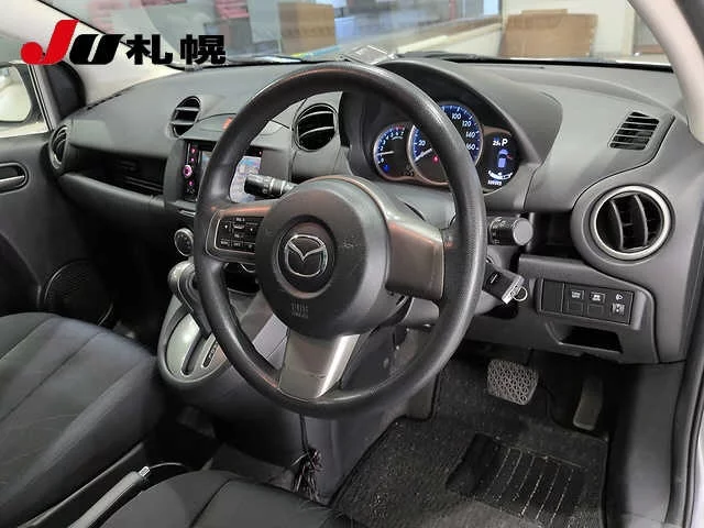 Mazda Demio  с аукциона в Японии