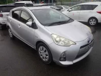 Цена авто Toyota Aqua с аукционов Японии, номер кузова NHP10, пробег 20 000, оценка 13