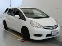 Цена авто Honda FIT SHUTTLE HYBRID с аукционов Японии, номер кузова GP2, пробег 103 000, оценка 2