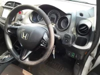 Цена авто Honda FIT SHUTTLE HYBRID с аукционов Японии, номер кузова GP2, пробег 131 000, оценка 4
